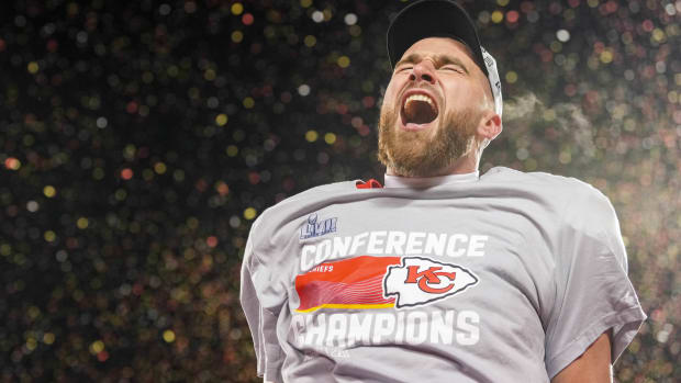 Travis Kelce celebrates after AFC Championship game.
